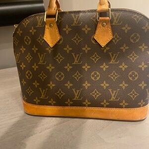 Authentic Louis Vuitton small Alma bag monogram